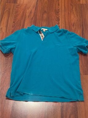 Authentic Burberry Mens Pique Polo Aqua Blue Large
Classic Embroidered Logo $395